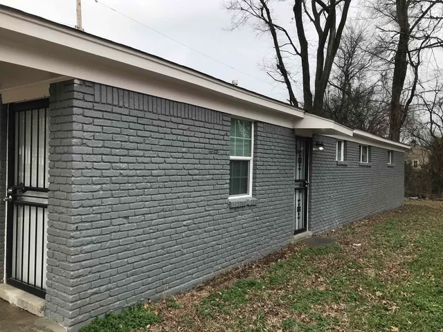a view of backyard of house