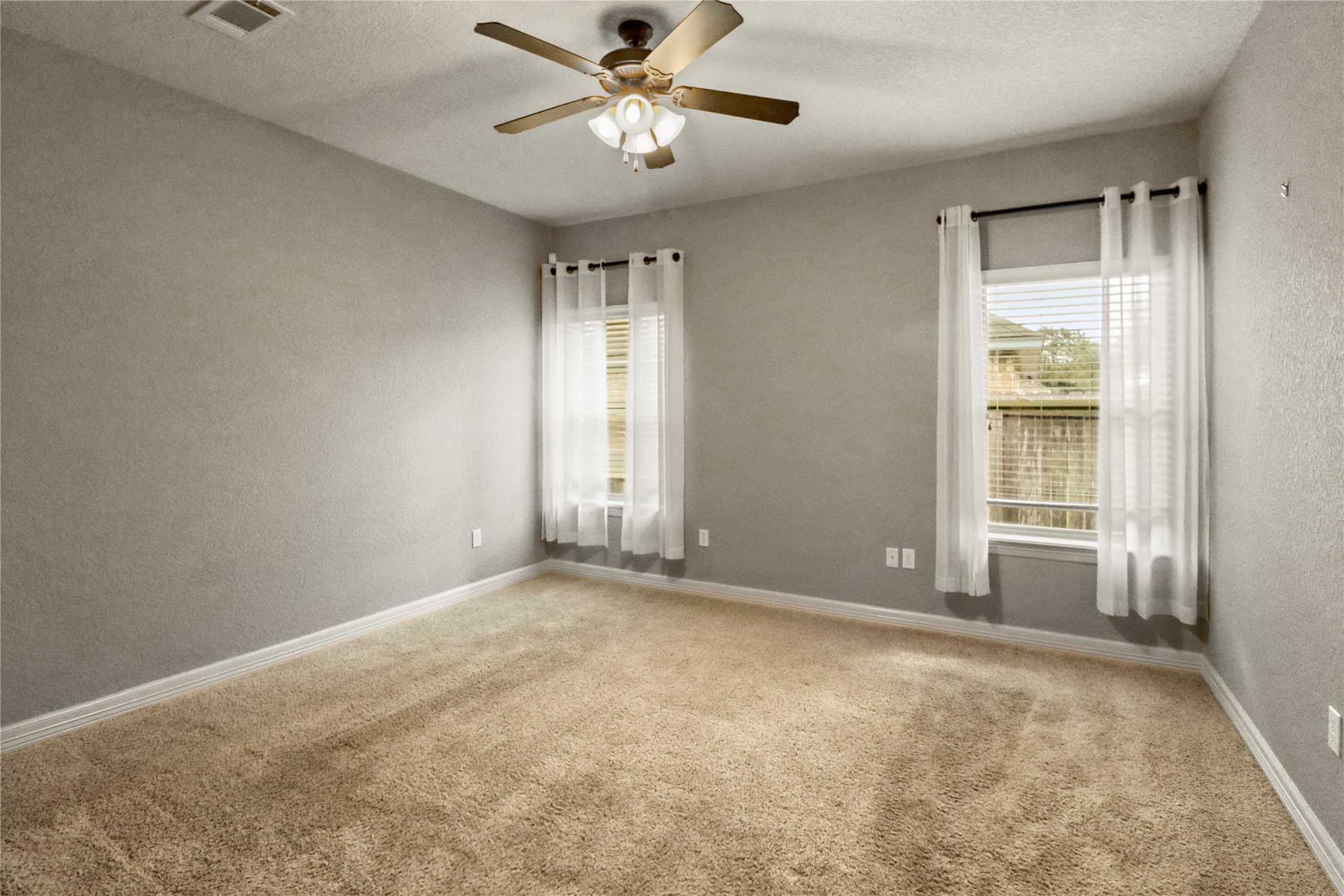 1012 Rosewood Lane Angleton, TX 77515 - Photo 14 of 21 a view of an empty room with a window