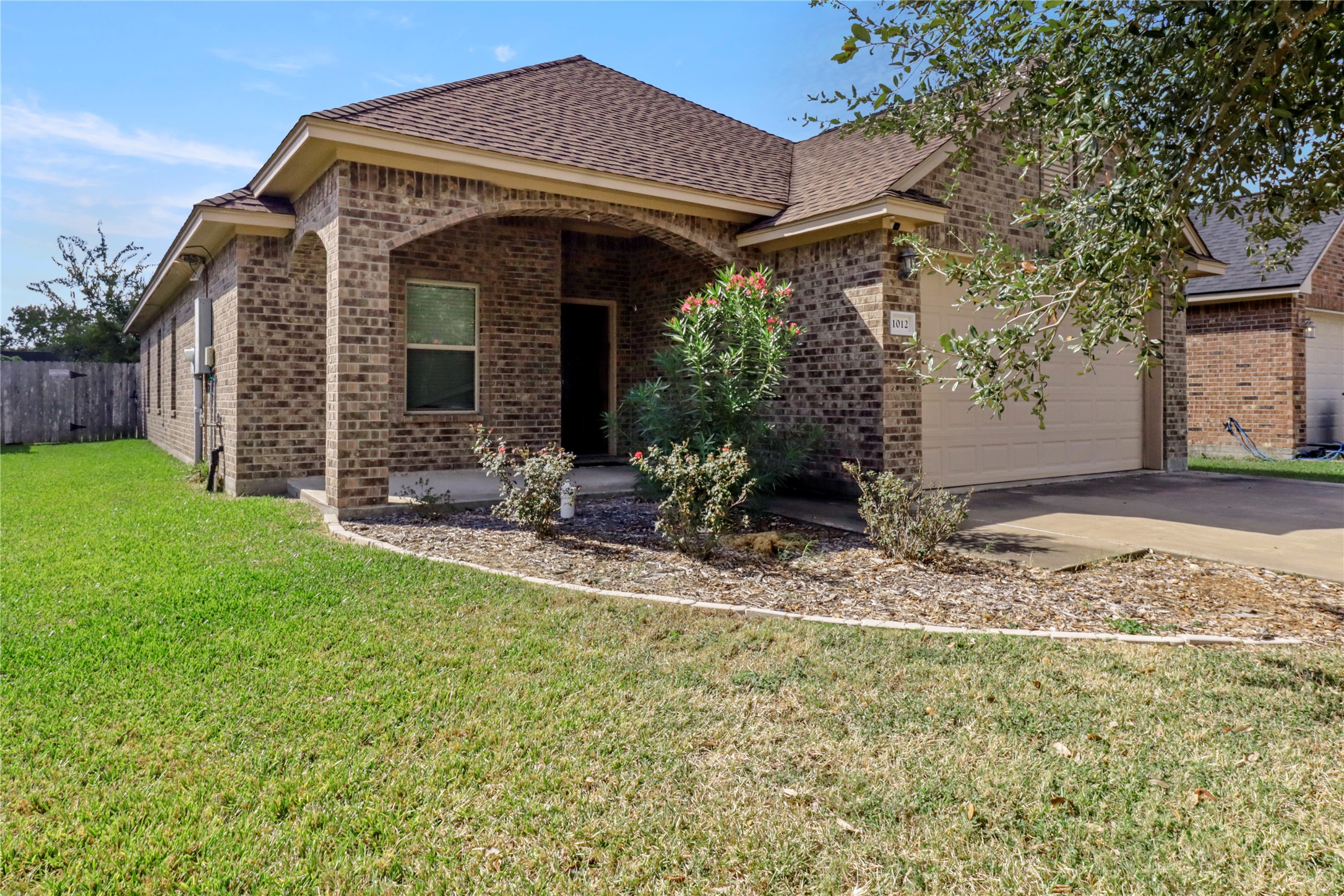 1012 Rosewood Lane Angleton, TX 77515 - Photo 3 of 21 a view of a house with backyard