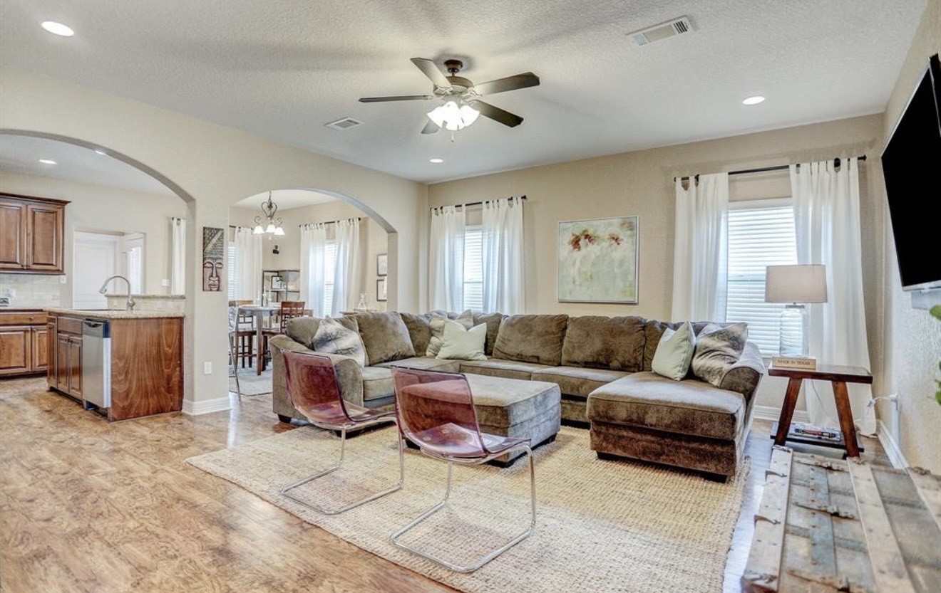 1012 Rosewood Lane Angleton, TX 77515 - Photo 6 of 21 a living room with furniture and a large window