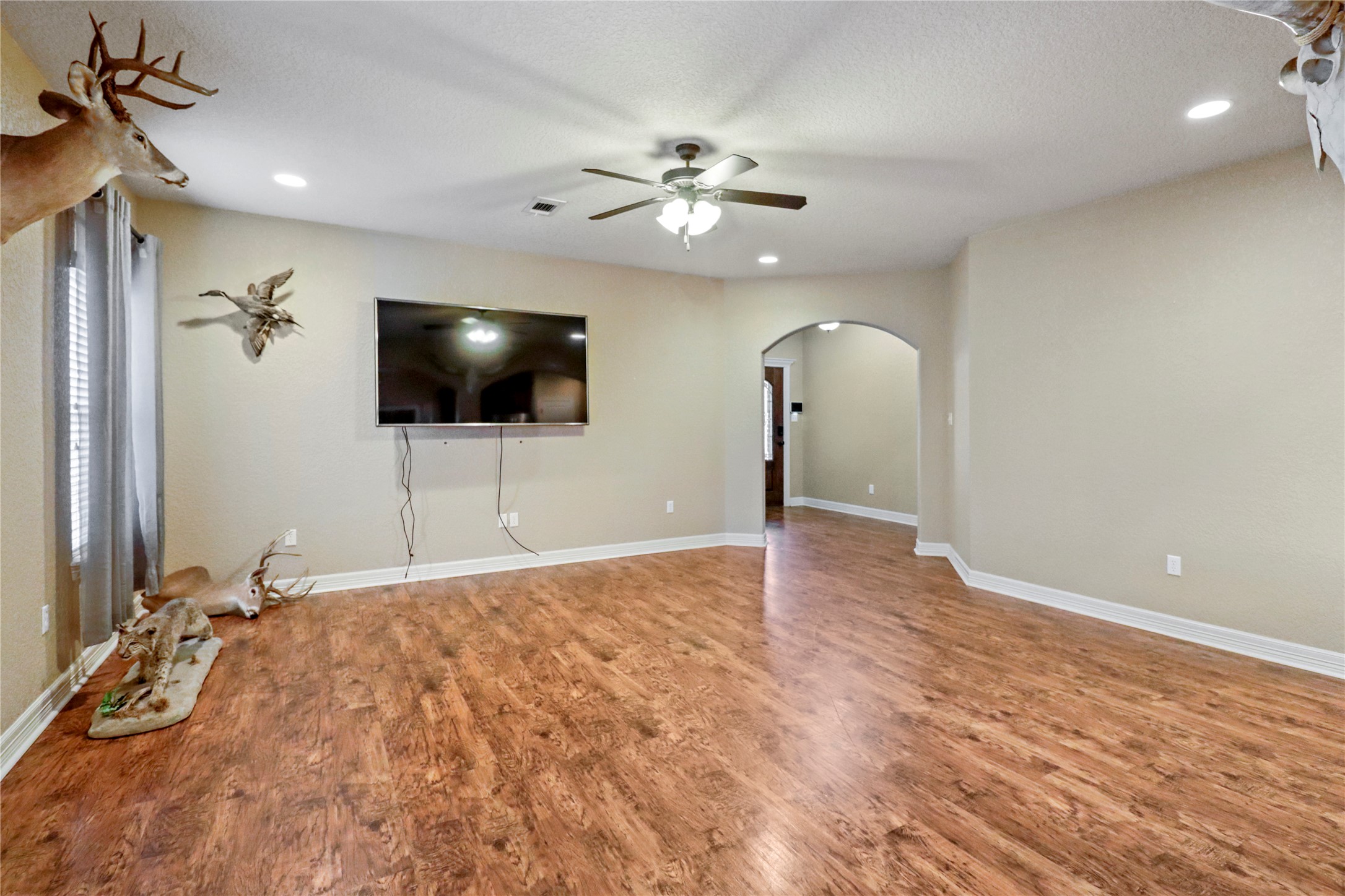 1012 Rosewood Lane Angleton, TX 77515 - Photo 8 of 21 a view of a livingroom with a flat screen tv