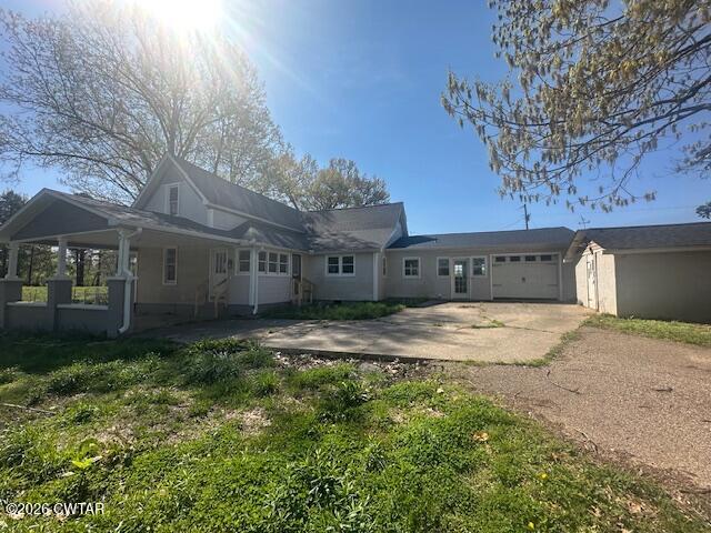 450 Kenny Road Martin, TN 38237 - Photo 2 of 17 a view of a yard with a house