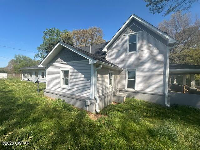 450 Kenny Road Martin, TN 38237 - Photo 3 of 17 a front view of a house with a yard