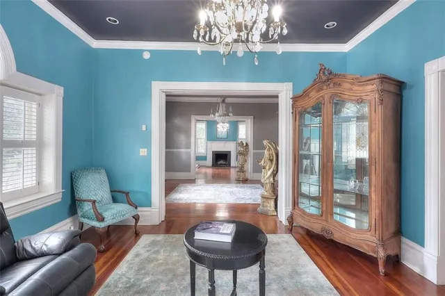 a large kitchen with a table and chairs