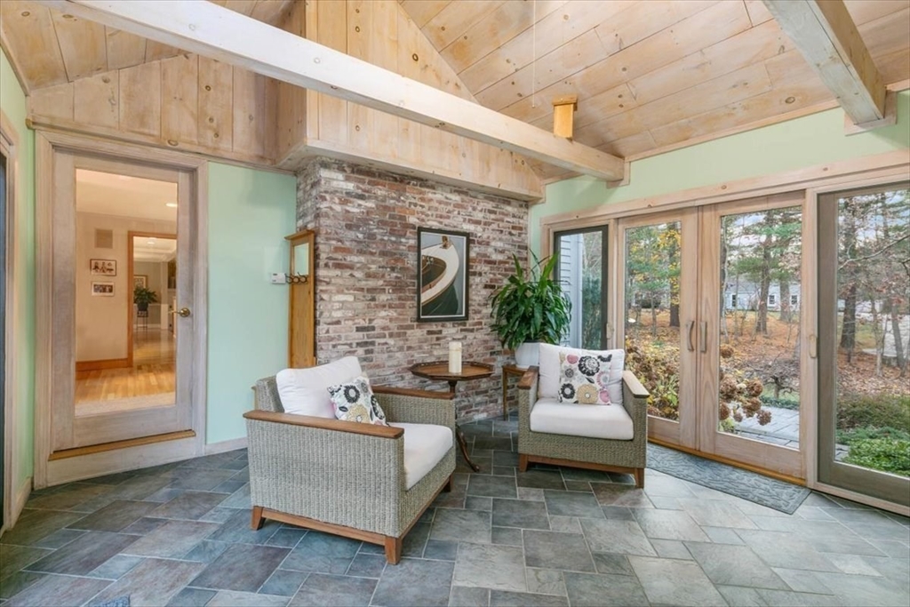 50 Stonecleave Road Boxford, MA 01921 - Photo 20 of 42 a living room with furniture and a floor to ceiling window