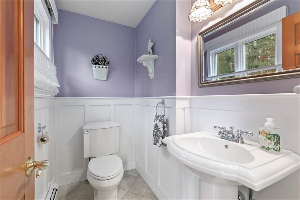 50 Stonecleave Road Boxford, MA 01921 - Photo 22 of 42 a bathroom with a sink and a toilet