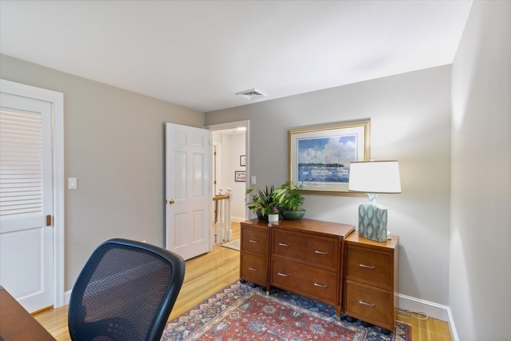 50 Stonecleave Road Boxford, MA 01921 - Photo 31 of 42 a room with furniture and wooden floor