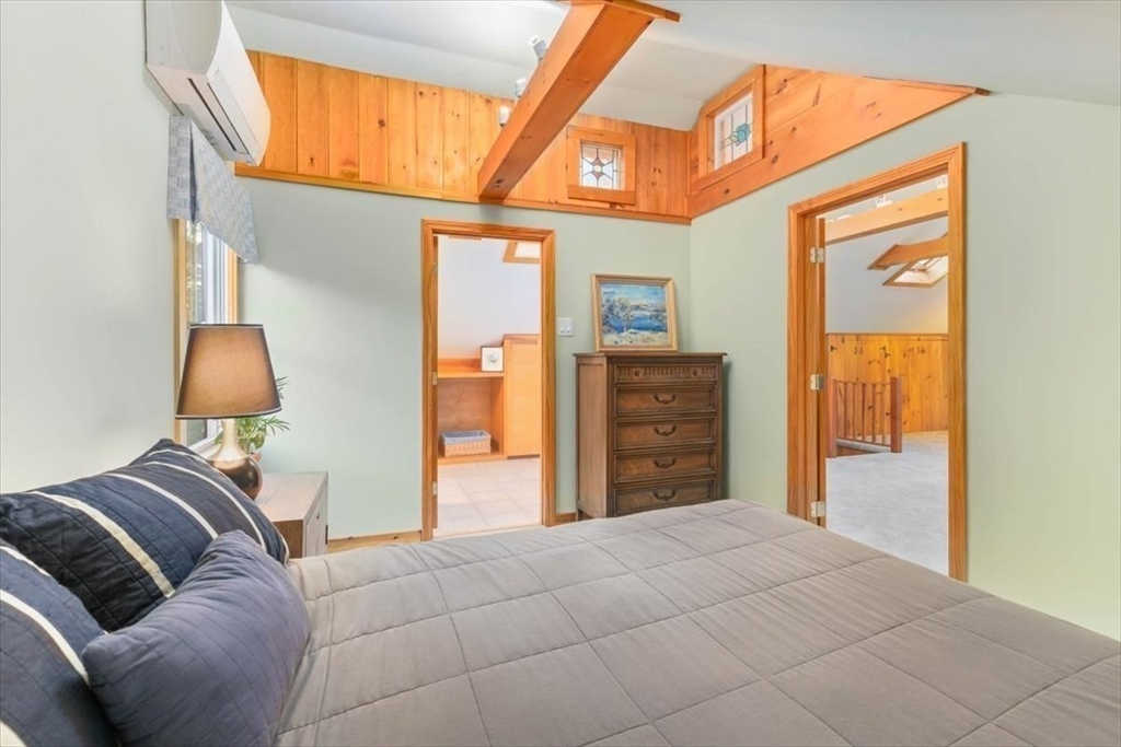 50 Stonecleave Road Boxford, MA 01921 - Photo 34 of 42 a bed room with a bed and a chair