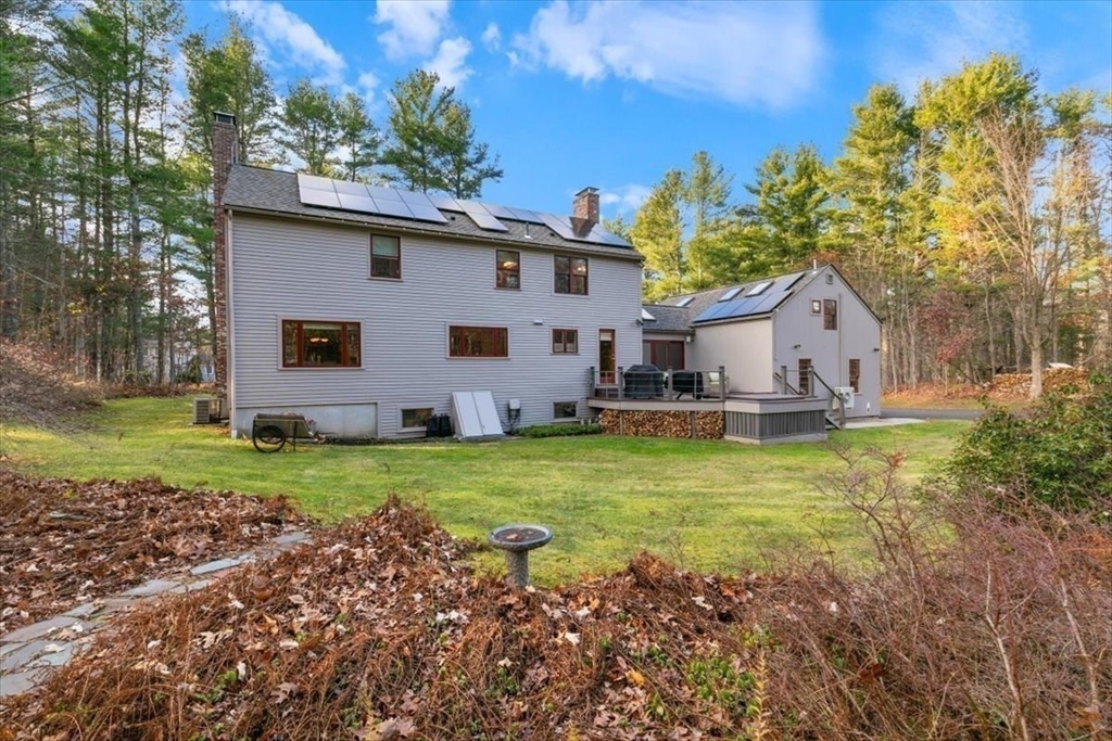 50 Stonecleave Road Boxford, MA 01921 - Photo 39 of 42 a front view of a house with garden