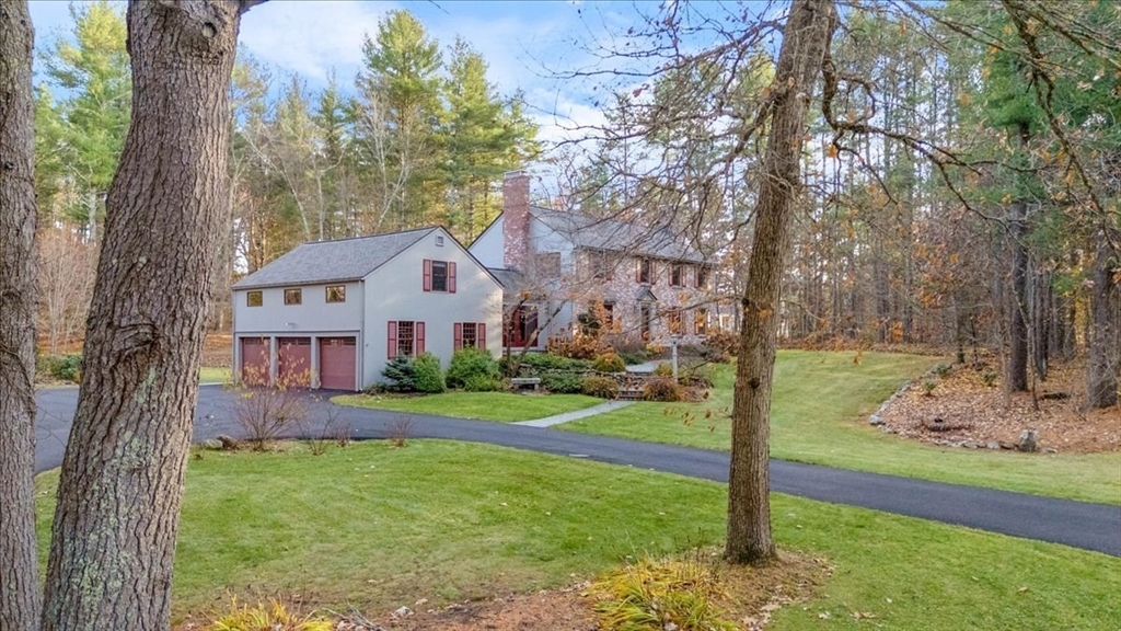 50 Stonecleave Road Boxford, MA 01921 - Photo 5 of 42 a front view of house with yard and green space