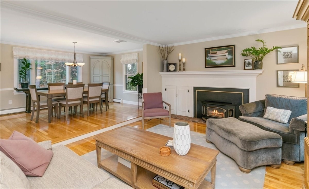 50 Stonecleave Road Boxford, MA 01921 - Photo 9 of 42 a living room with furniture fireplace and a table