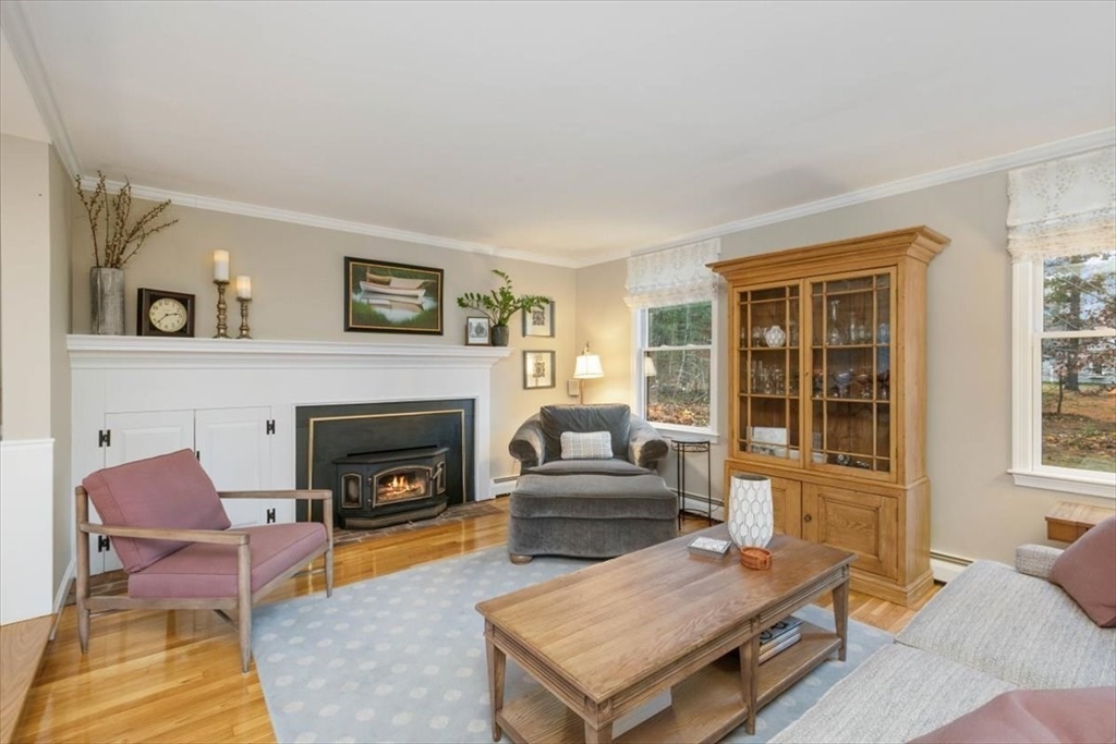 50 Stonecleave Road Boxford, MA 01921 - Photo 10 of 42 a living room with furniture and a fireplace