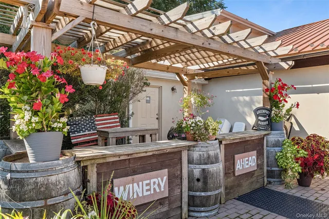a building with potted plants in front of it