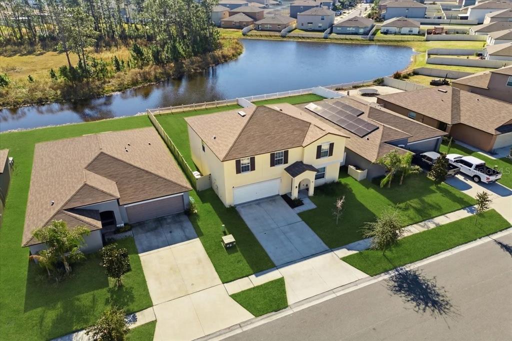 2175 Old Mining Road Lakeland, FL 33801 - Photo 6 of 51 an aerial view of a house with swimming pool and outdoor seating