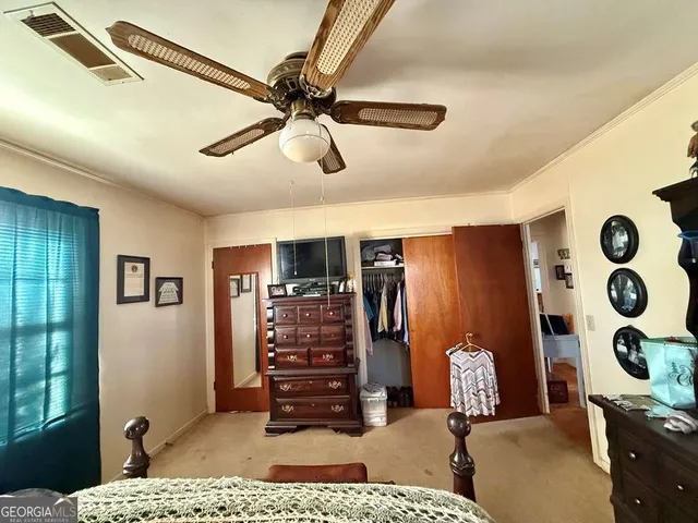 a view of livingroom with furniture and windows
