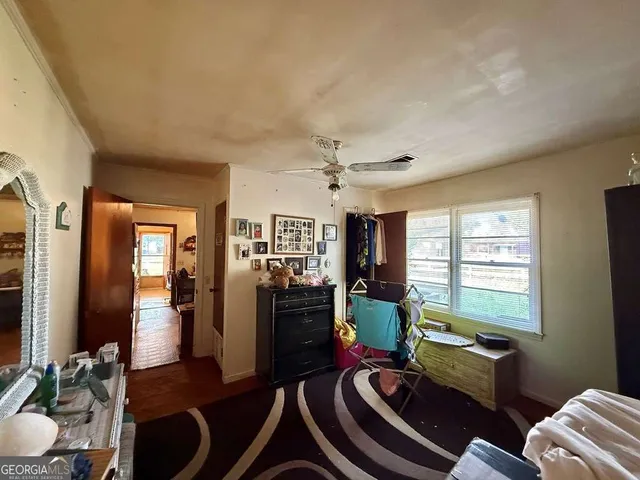 a room with furniture or couch and a window