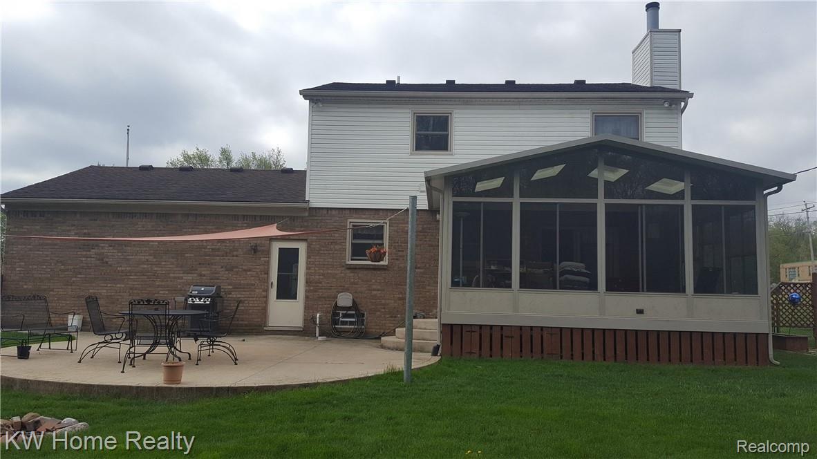36650 West Eleven Mile Road Farmington, MI 48331 - Photo 13 of 36 Patio For Summer Backyard BBQ's and Large Yard for Gathering