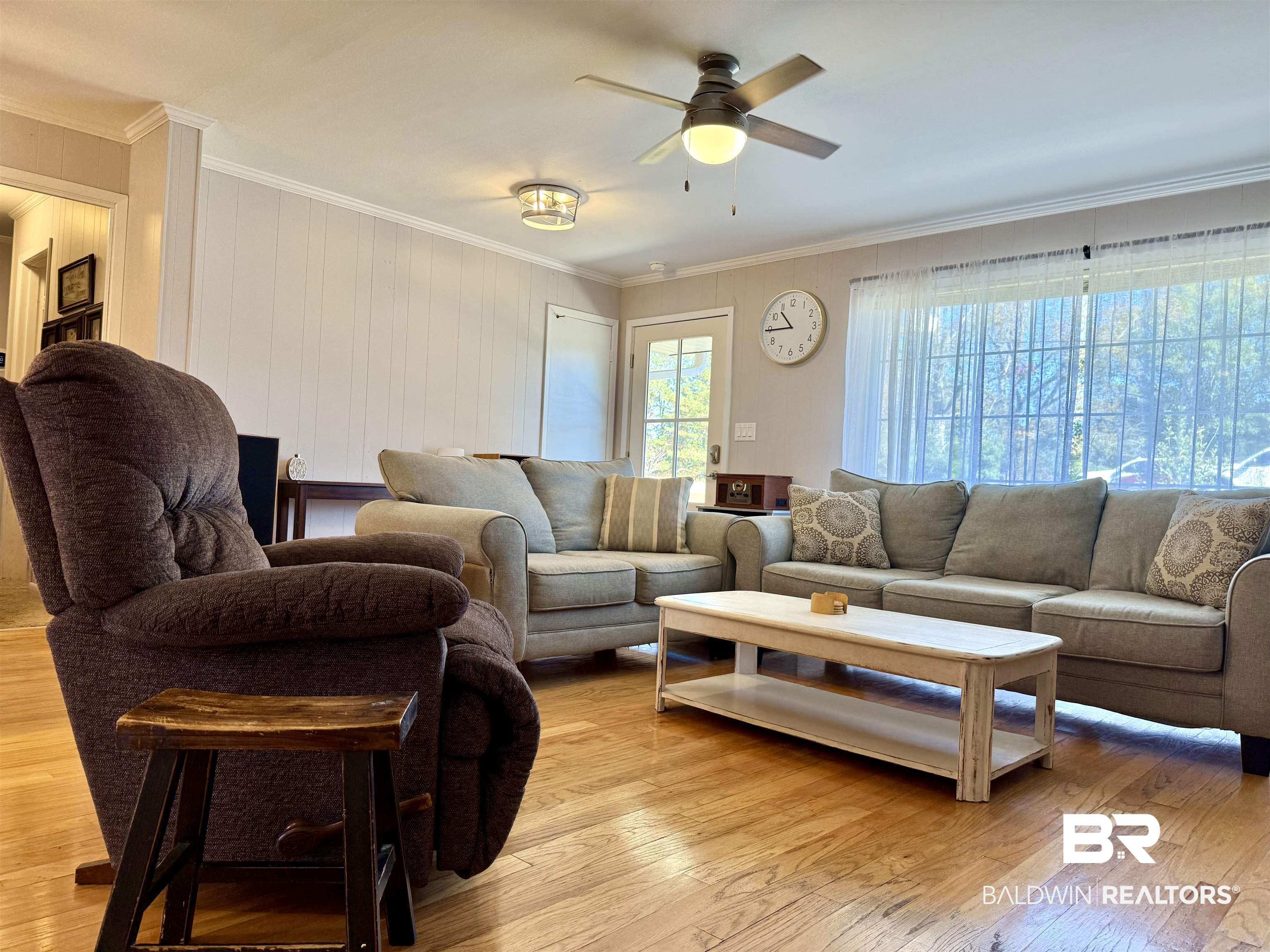 2785 Appleton Road Brewton, AL 36426 - Photo 4 of 28 Living area with ornamental molding, light wood-style flooring, and ceiling fan