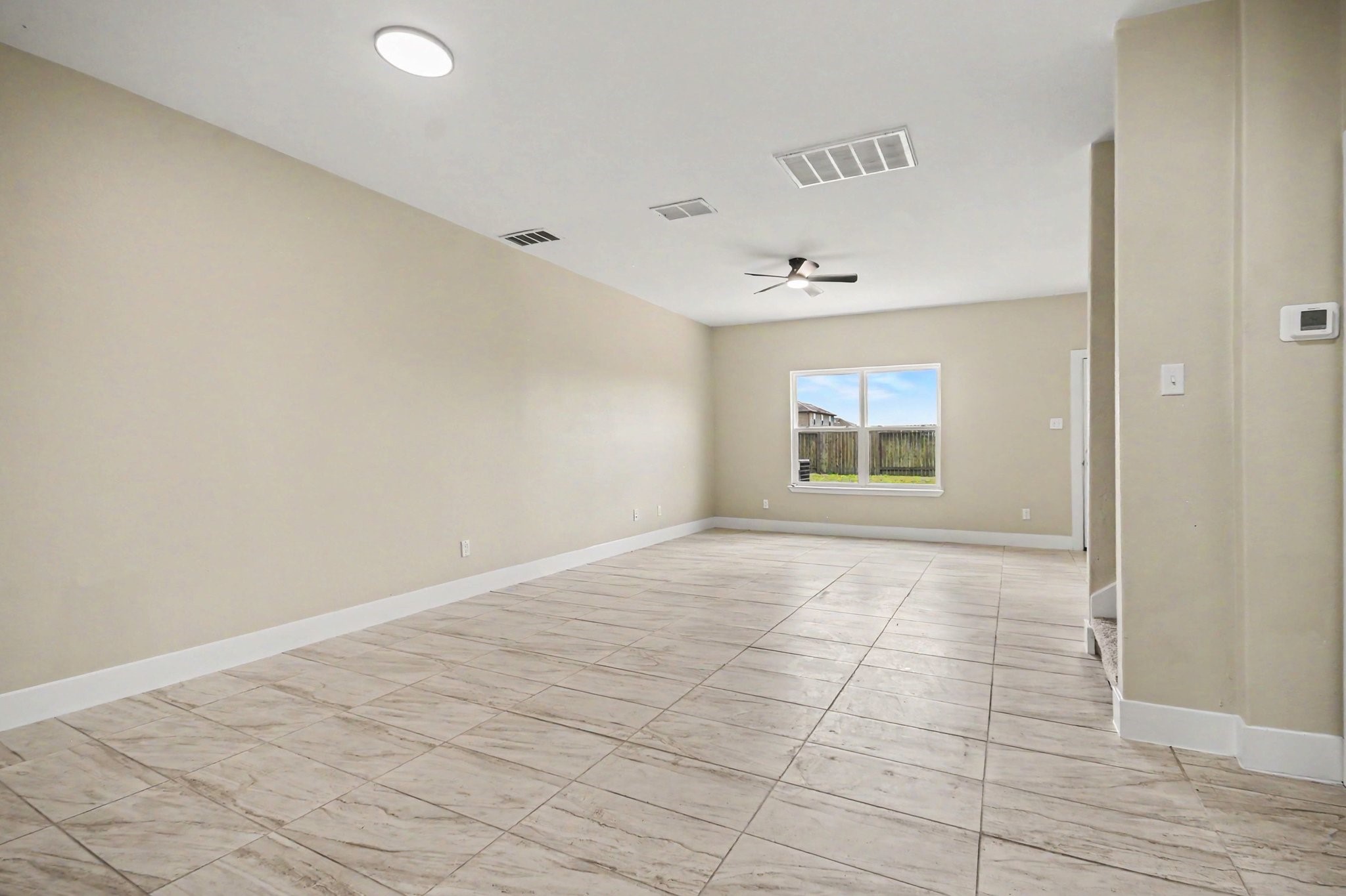 1322 Diamond Drape Drive Rosharon, TX 77583 - Photo 9 of 45 a view of an empty room and window