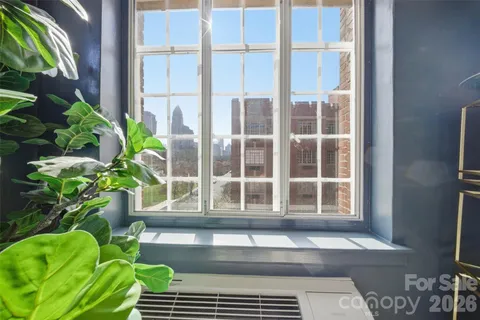 a kitchen with a stove and a microwave