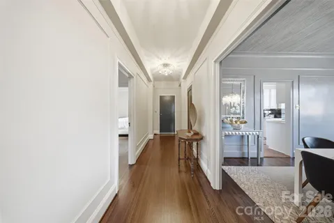 a view of gallery with wooden floor