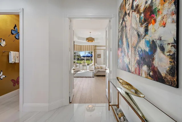 a spacious bathroom with double sink and a mirror