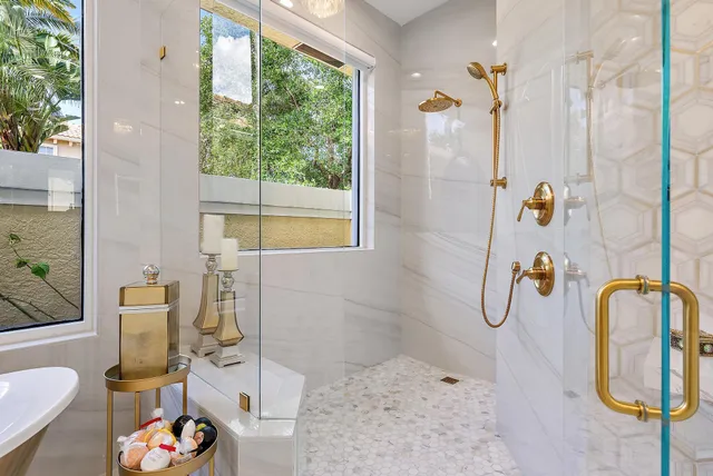 a view of a living room and entryway