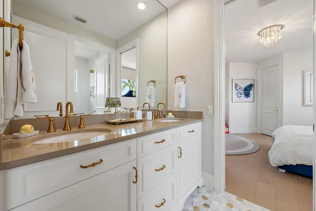 a view of a patio with a dining table and chairs