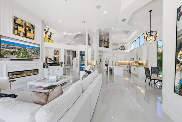 a dining room with furniture and wooden floor