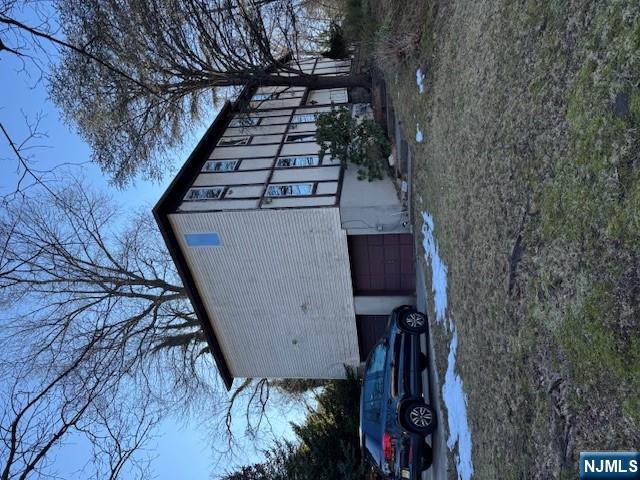 212 Filippe Court Paramus, NJ 07652 - Photo 2 of 16 a view of a house with a yard