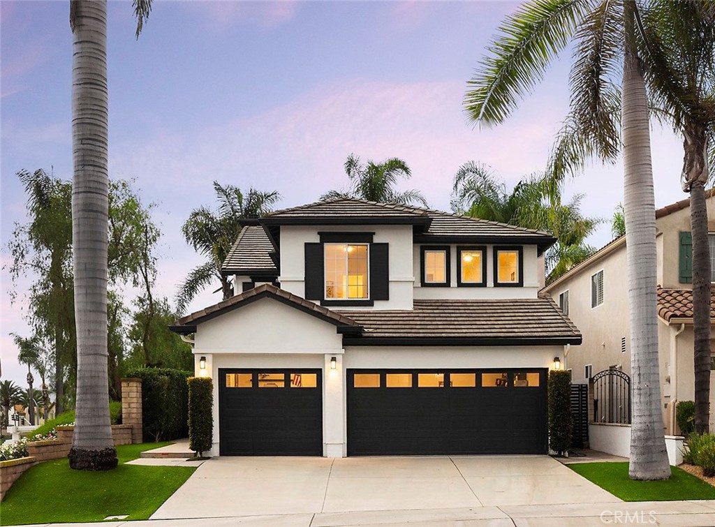 27871 Country Lane Road Laguna Niguel, CA 92677 - Photo 1 of 35 a front view of a house with a garden