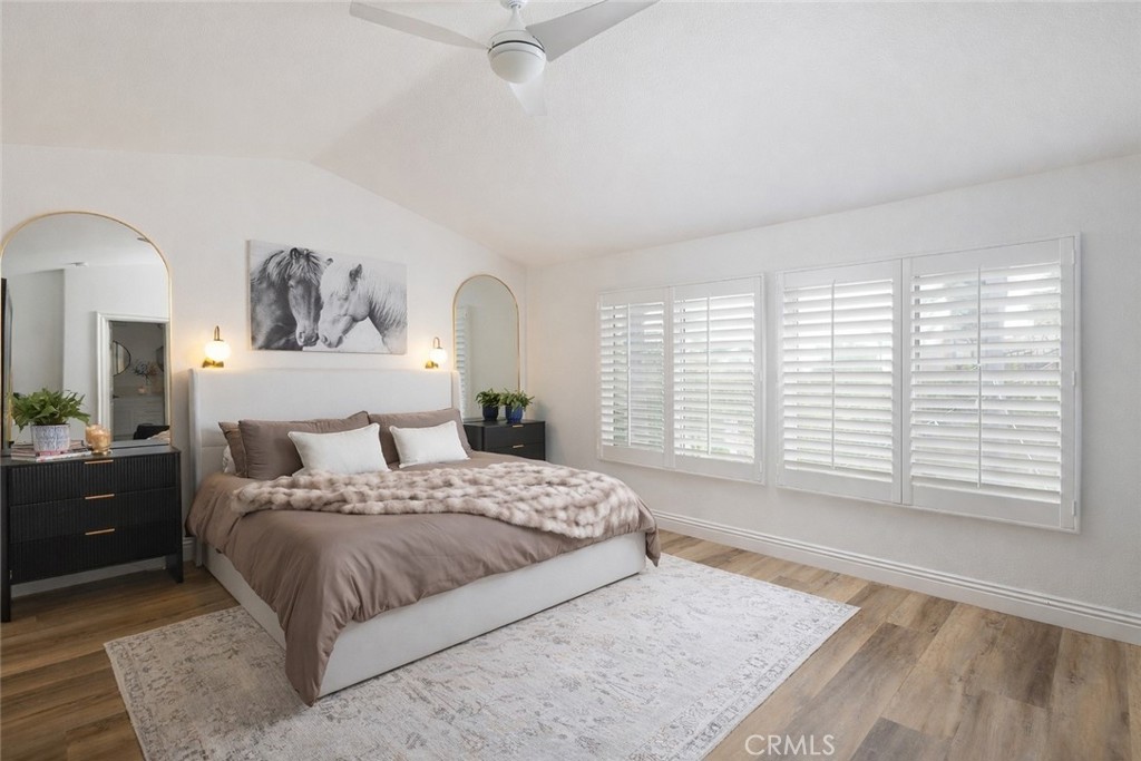 27871 Country Lane Road Laguna Niguel, CA 92677 - Photo 18 of 35 a bedroom with a large bed and a window