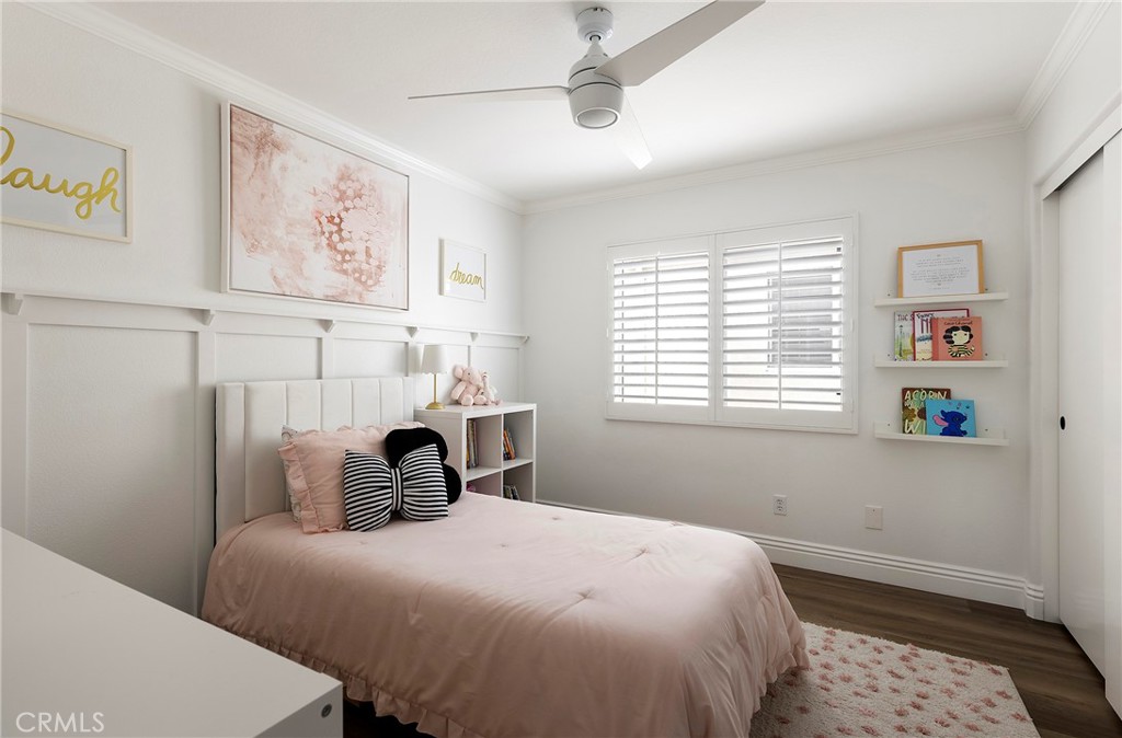 27871 Country Lane Road Laguna Niguel, CA 92677 - Photo 25 of 35 a bedroom with a bed a wall painting and a window