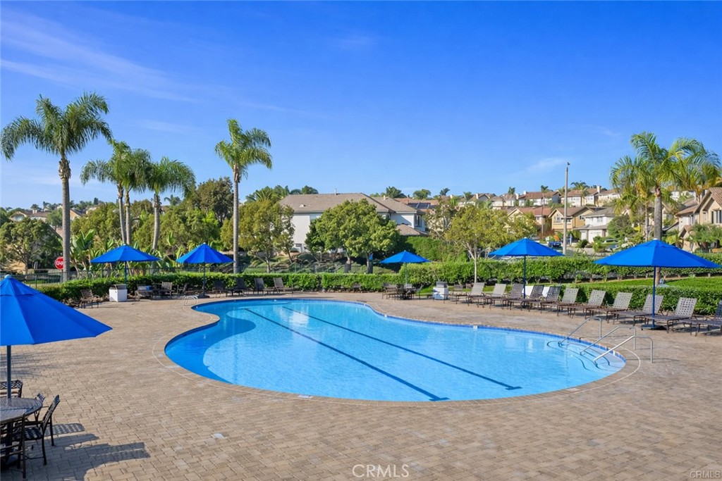 27871 Country Lane Road Laguna Niguel, CA 92677 - Photo 30 of 35 a view of a swimming pool with an outdoor space and seating area