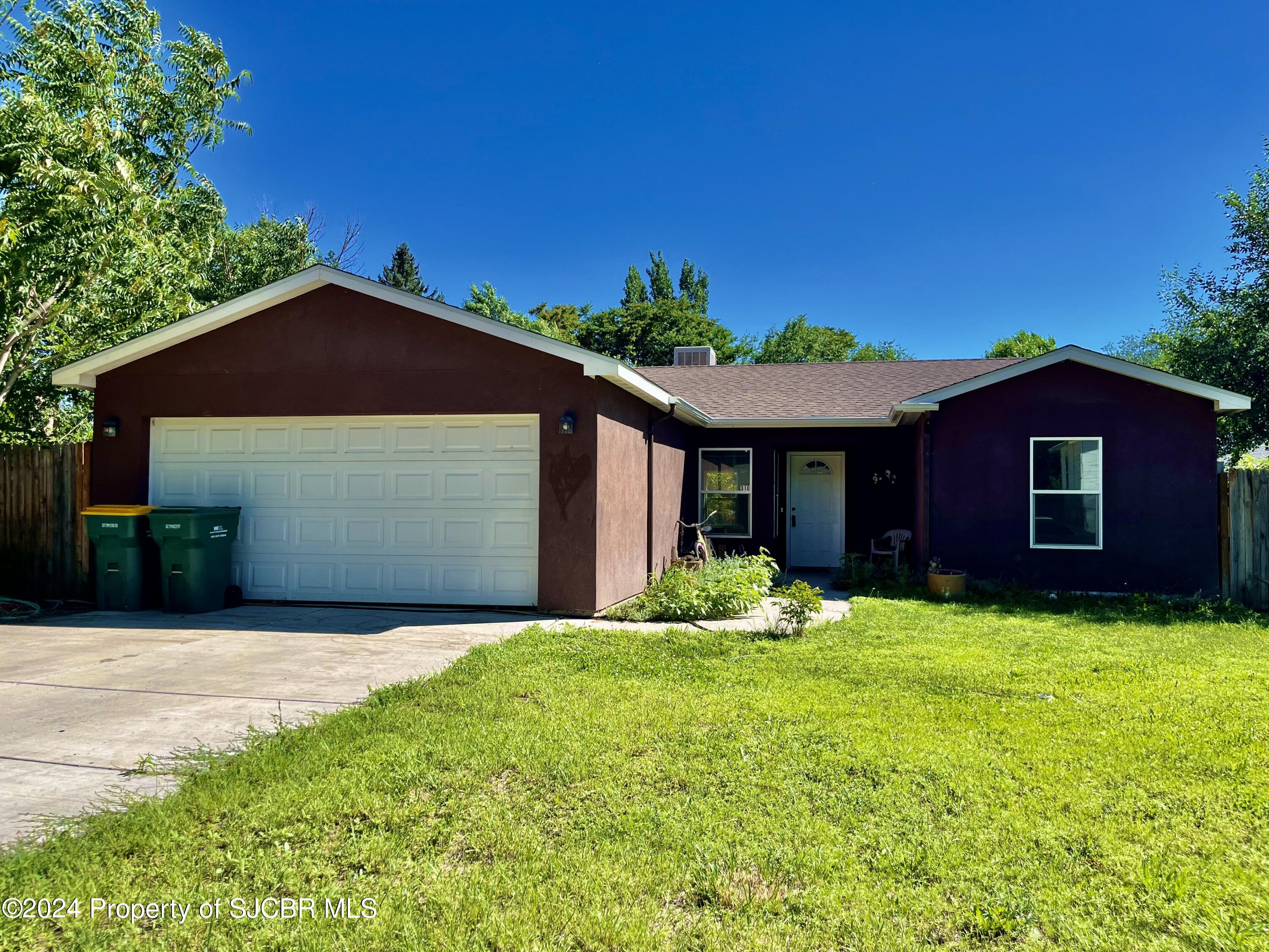 310 East Blanco Street Aztec, NM 87410 - Photo 1 of 1 Front of House