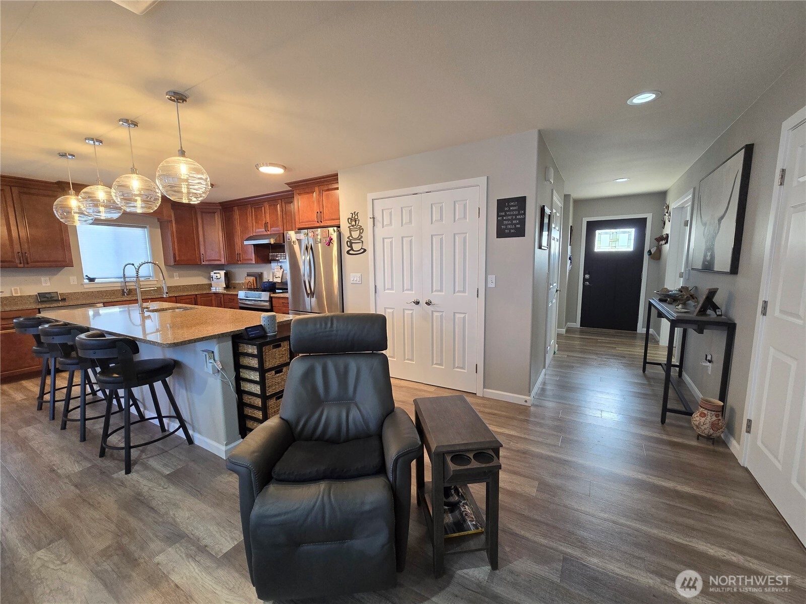 40 Topaz Way Sequim, WA 98382 - Photo 14 of 40 a living room with furniture and a wooden floor