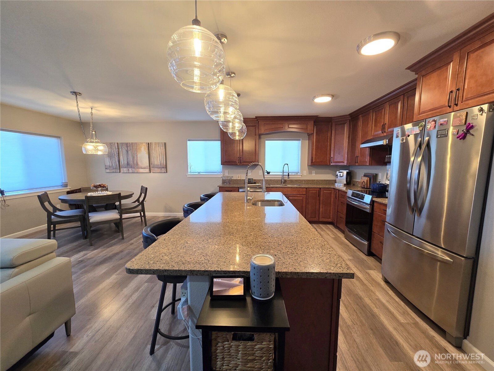 40 Topaz Way Sequim, WA 98382 - Photo 16 of 40 a large kitchen with a table and chairs