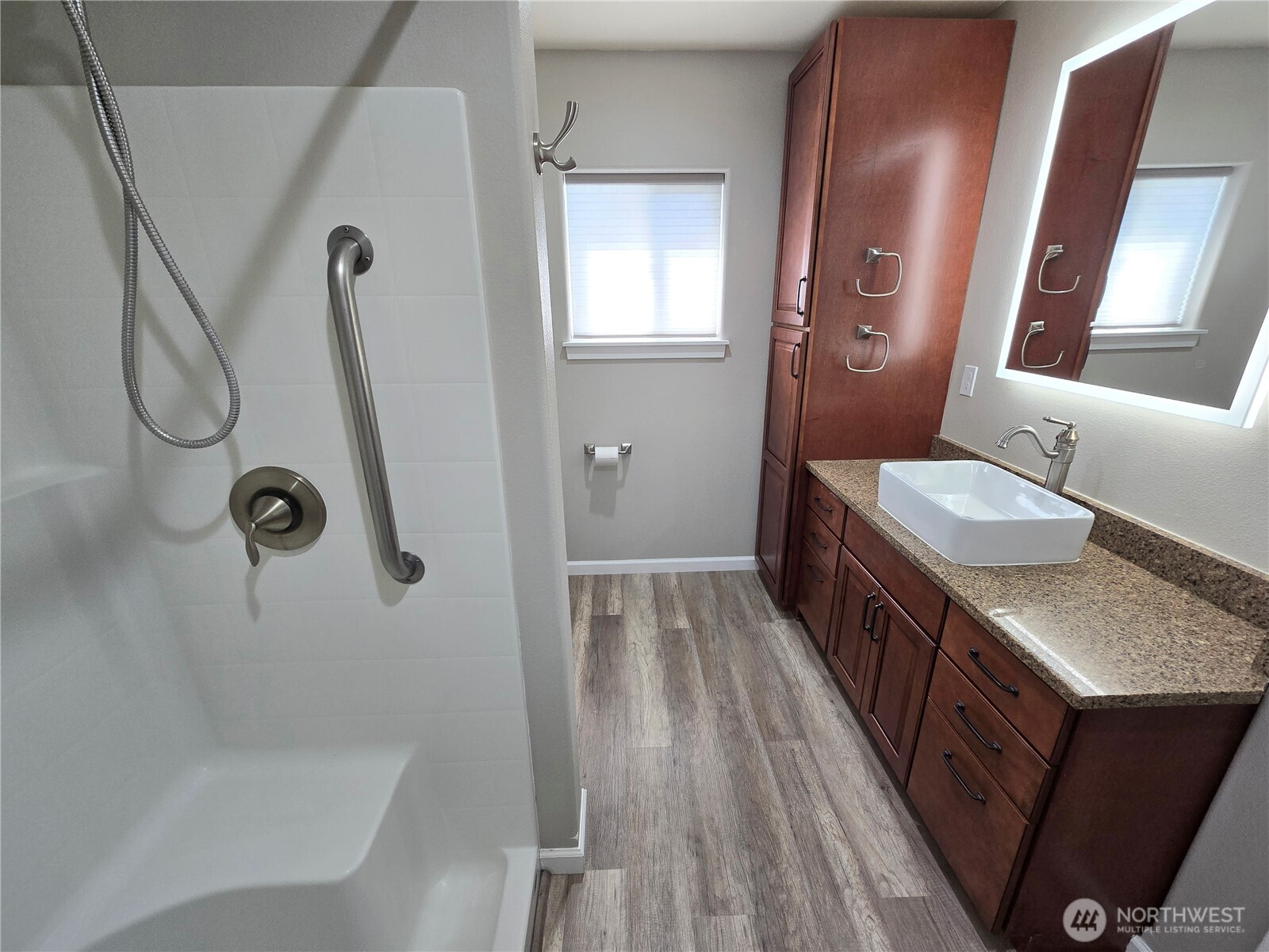 40 Topaz Way Sequim, WA 98382 - Photo 26 of 40 a bathroom with a sink a toilet a mirror and shower