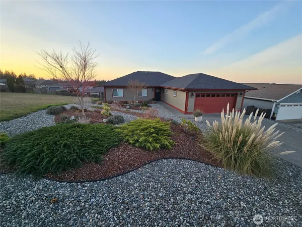 a house view with a garden space