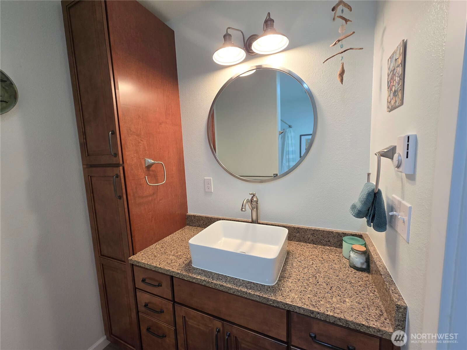 40 Topaz Way Sequim, WA 98382 - Photo 33 of 40 a bathroom with a sink and a mirror