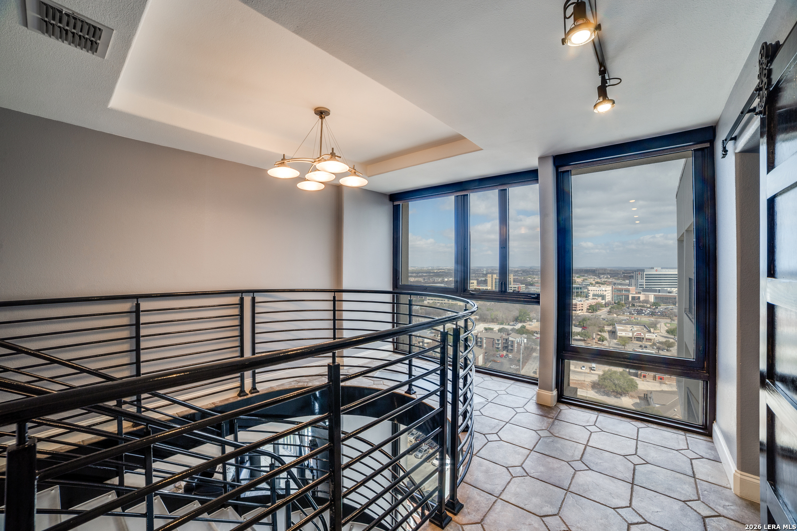 7701 Wurzbach Road, Unit 2303 San Antonio, TX 78229 - Photo 12 of 32 a view of a livingroom with furniture