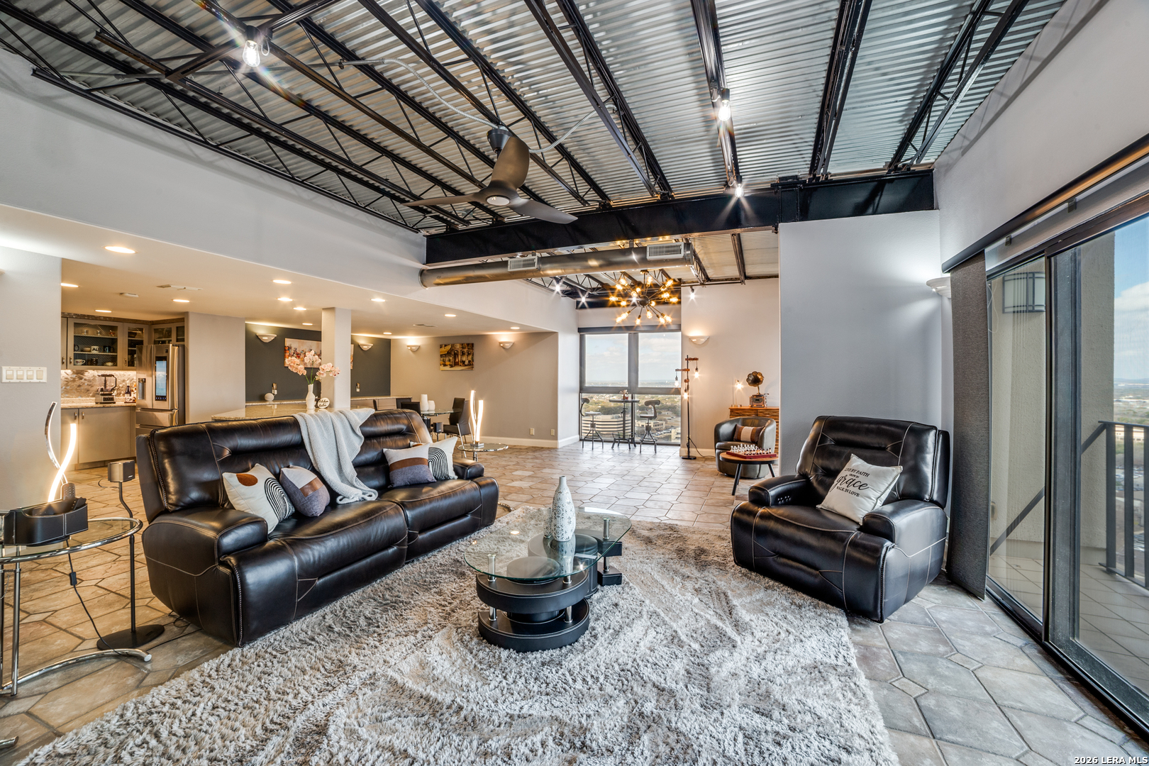 7701 Wurzbach Road, Unit 2303 San Antonio, TX 78229 - Photo 2 of 32 a living room with furniture