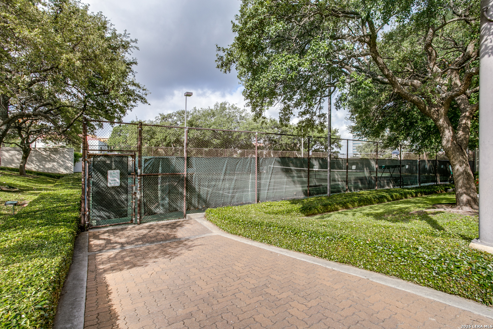 7701 Wurzbach Road, Unit 2303 San Antonio, TX 78229 - Photo 28 of 32 a view of a park with large trees