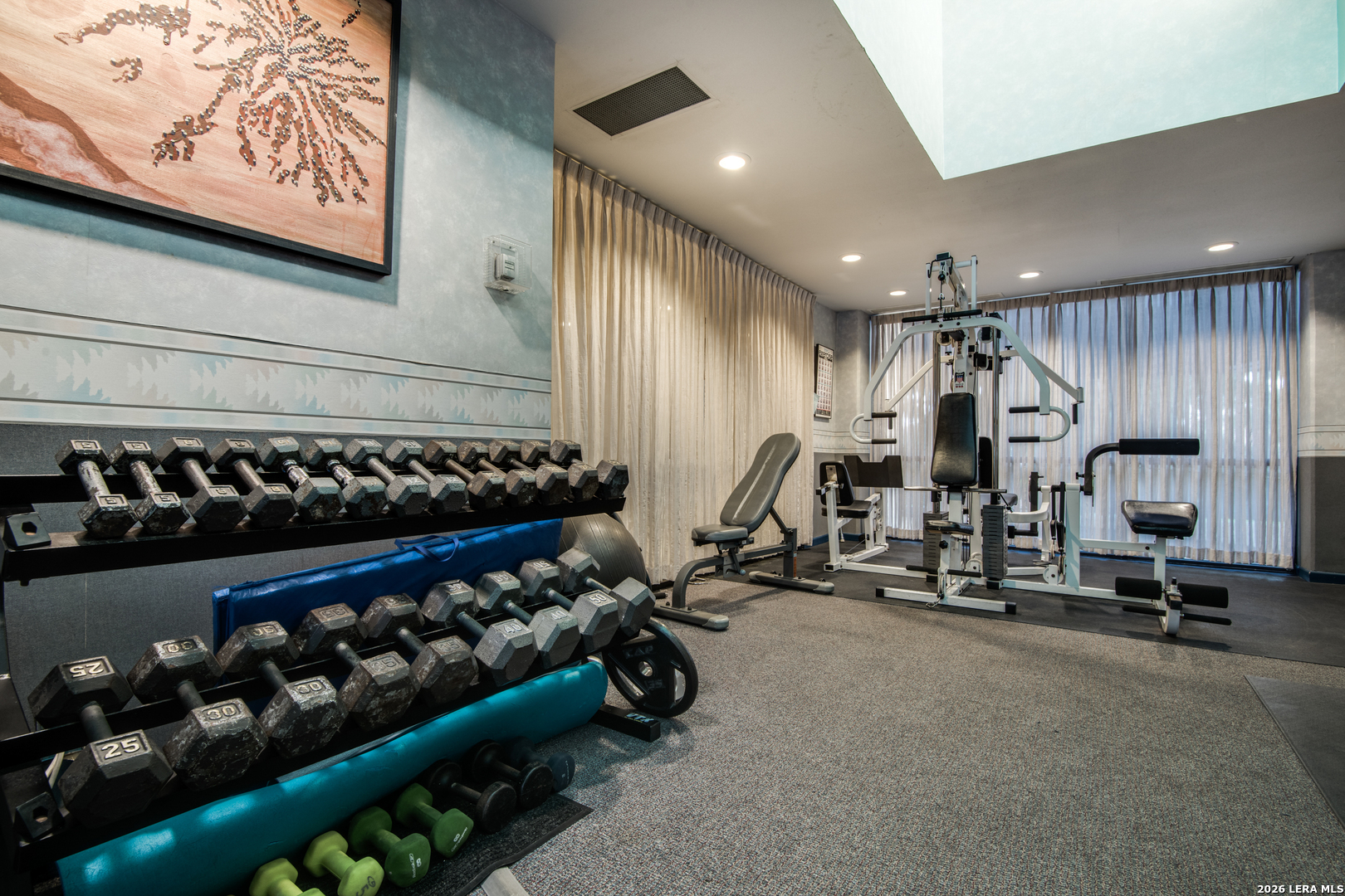 7701 Wurzbach Road, Unit 2303 San Antonio, TX 78229 - Photo 29 of 32 a view of a room with gym equipment
