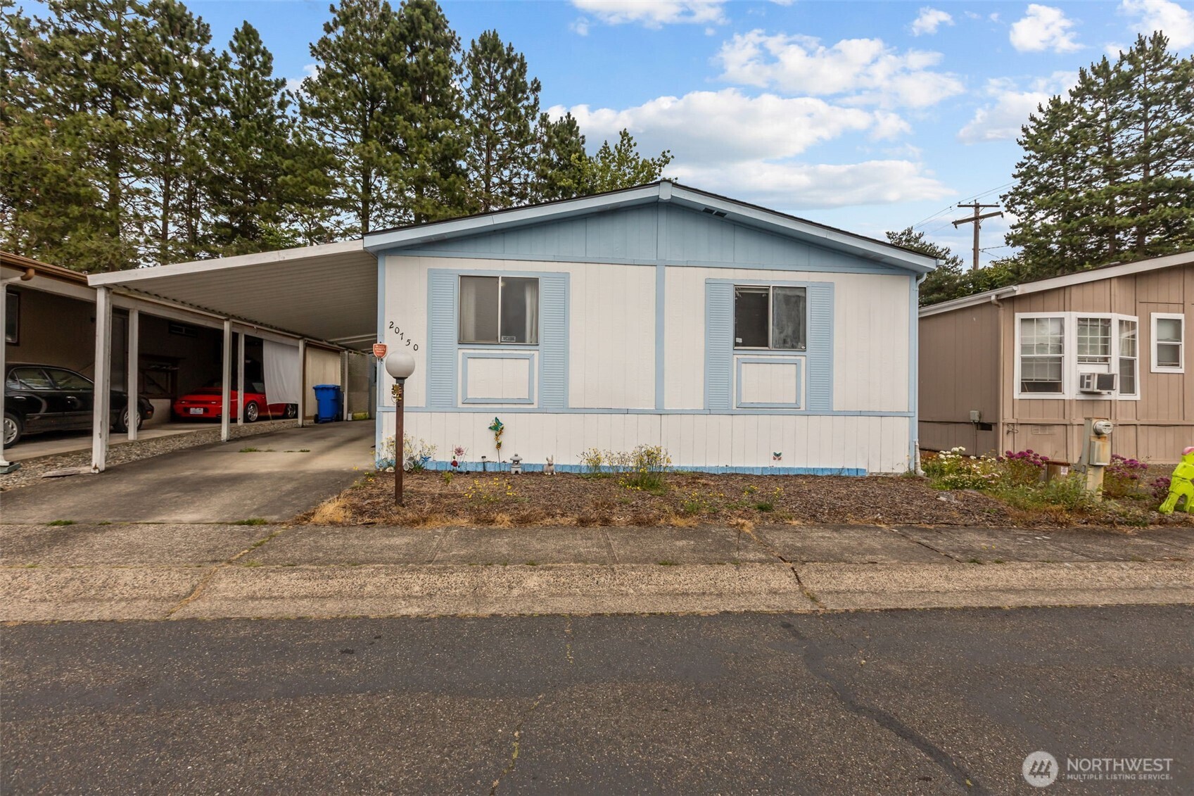 a house with trees in the background
