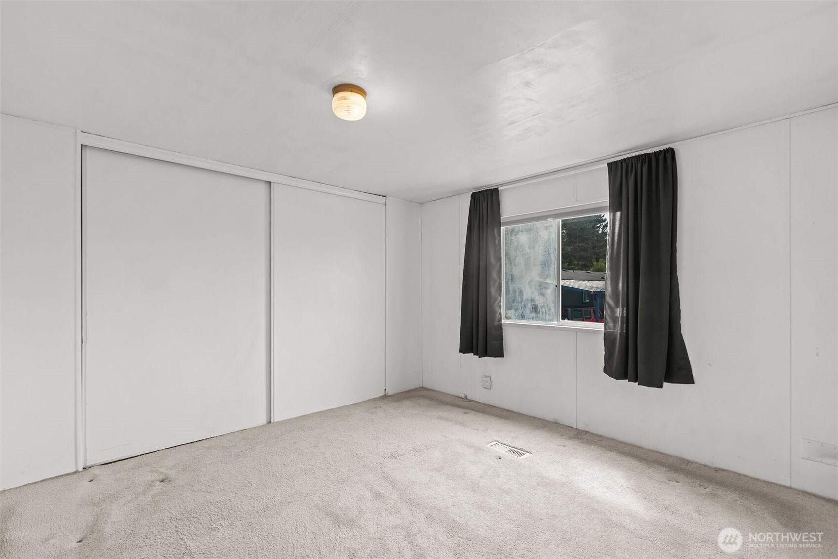 20750 113th Place Southeast Kent, WA 98031 - Photo 19 of 38 an empty room with windows