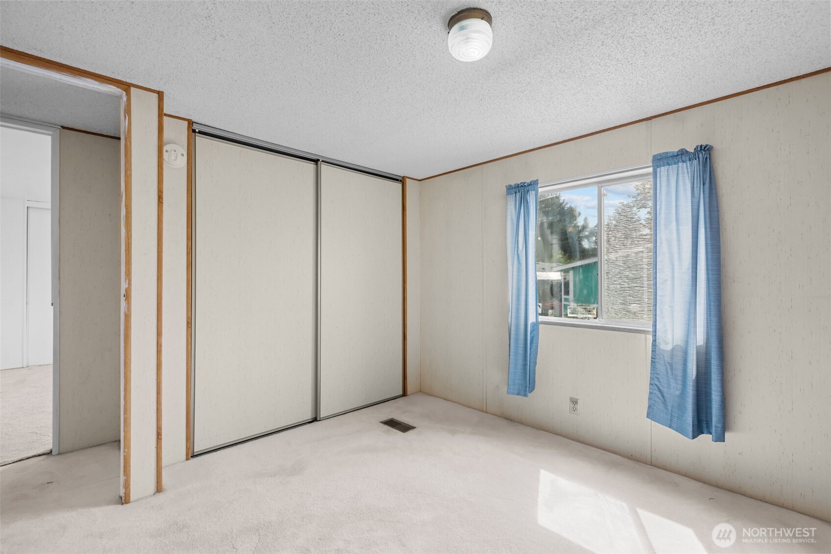 20750 113th Place Southeast Kent, WA 98031 - Photo 27 of 38 a view of a livingroom with an empty space and window