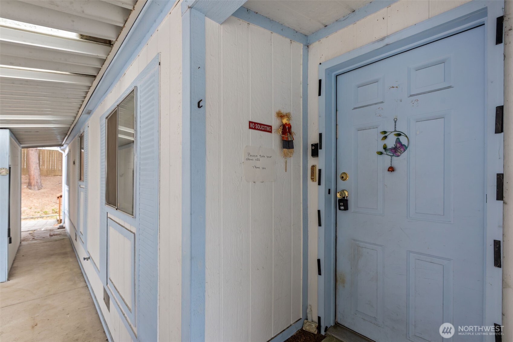 20750 113th Place Southeast Kent, WA 98031 - Photo 29 of 38 a view of a hallway with wooden shelves
