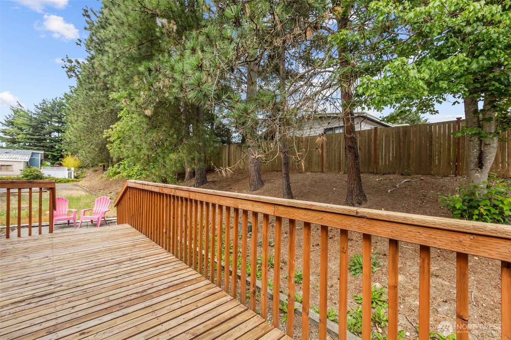 20750 113th Place Southeast Kent, WA 98031 - Photo 31 of 38 a balcony with wooden floor and fence