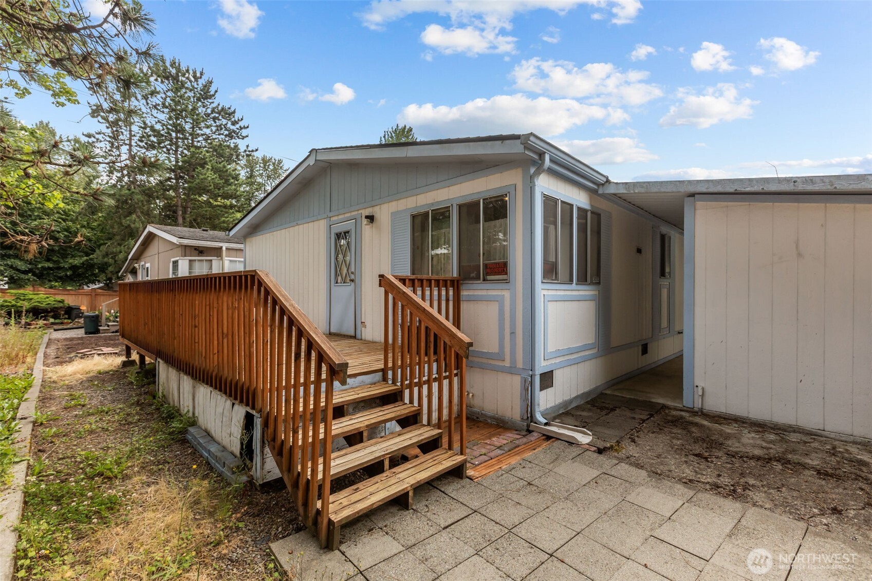 20750 113th Place Southeast Kent, WA 98031 - Photo 33 of 38 a view of a house with wooden fence and a stairs